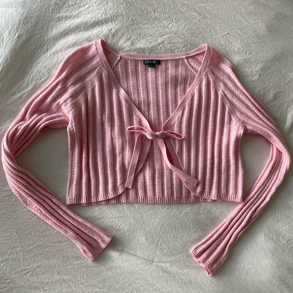 Pink crochet cropped sweater with bow detail